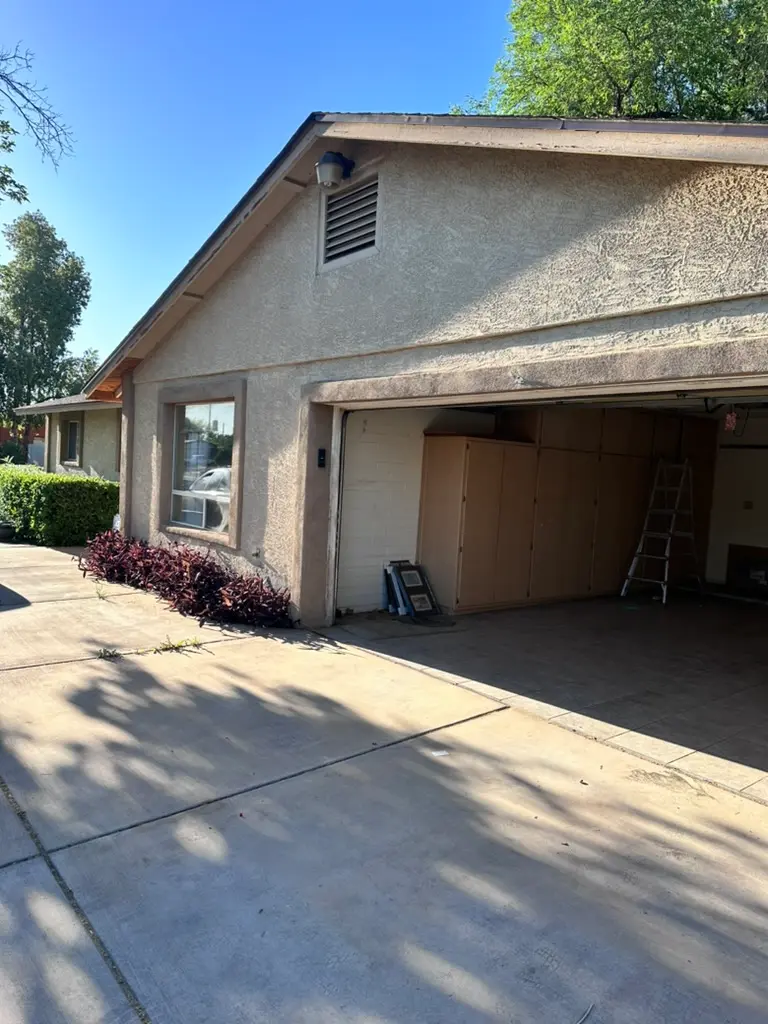 Redfield before POV exterior garage and window